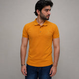 Mustard polo shirt for men with embroidered chest detail, front view