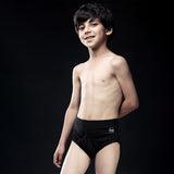 Boys' Black Brief Underwear - Model Standing Pose On Black Background