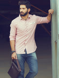 Men's pink shirt, model leaning pose with bag