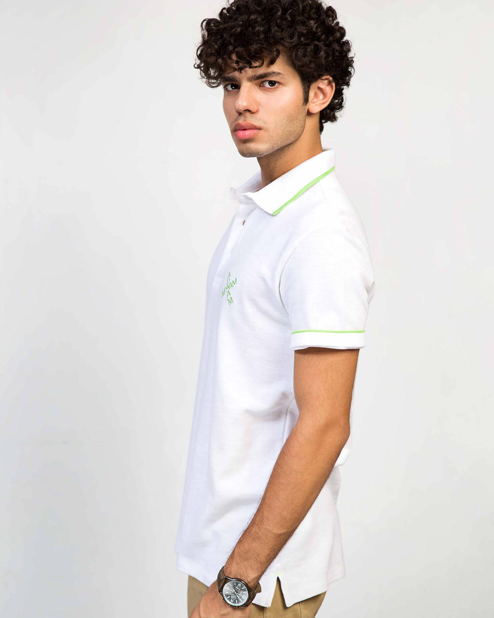 ADAM Men's White Polo Shirt – Side Angle Showing Regular Fit Silhouette and Ribbed Cuffs