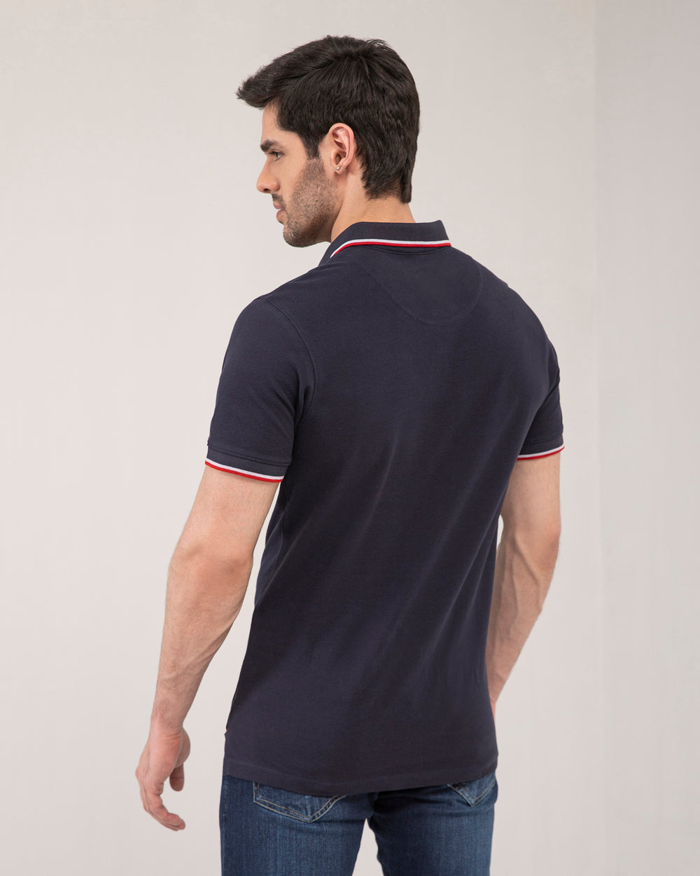 ADAM Men's Regular Fit Navy Polo – Side View Showing Contrast Collar and Classic Silhouette