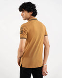 Camel tan polo shirt, black tipping collar, back view