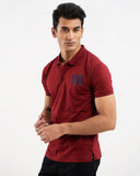 Man in maroon polo shirt, back view