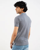 Man in grey polo shirt, back view