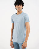Man in light blue t-shirt, side view