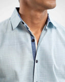 Close-up of sky blue shirt fabric and front pocket – ADAM men's casual wear