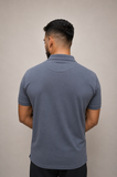 Grey polo shirt back view relaxed fit men's clothing