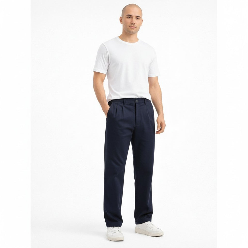 Men's navy blue chinos pants front view, relaxed fit cotton trousers with pleated front — Chinos