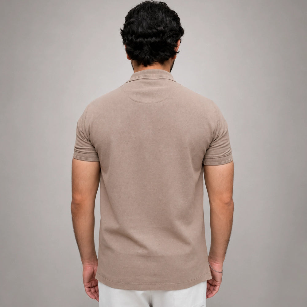 Men's beige polo shirt back view showing regular fit silhouette