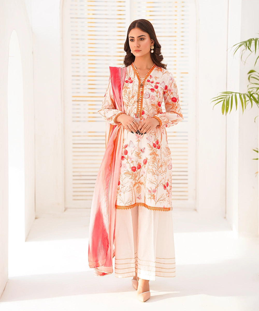 Orange floral printed 3-piece suit with pink dupatta, front standing pose — Orange 13