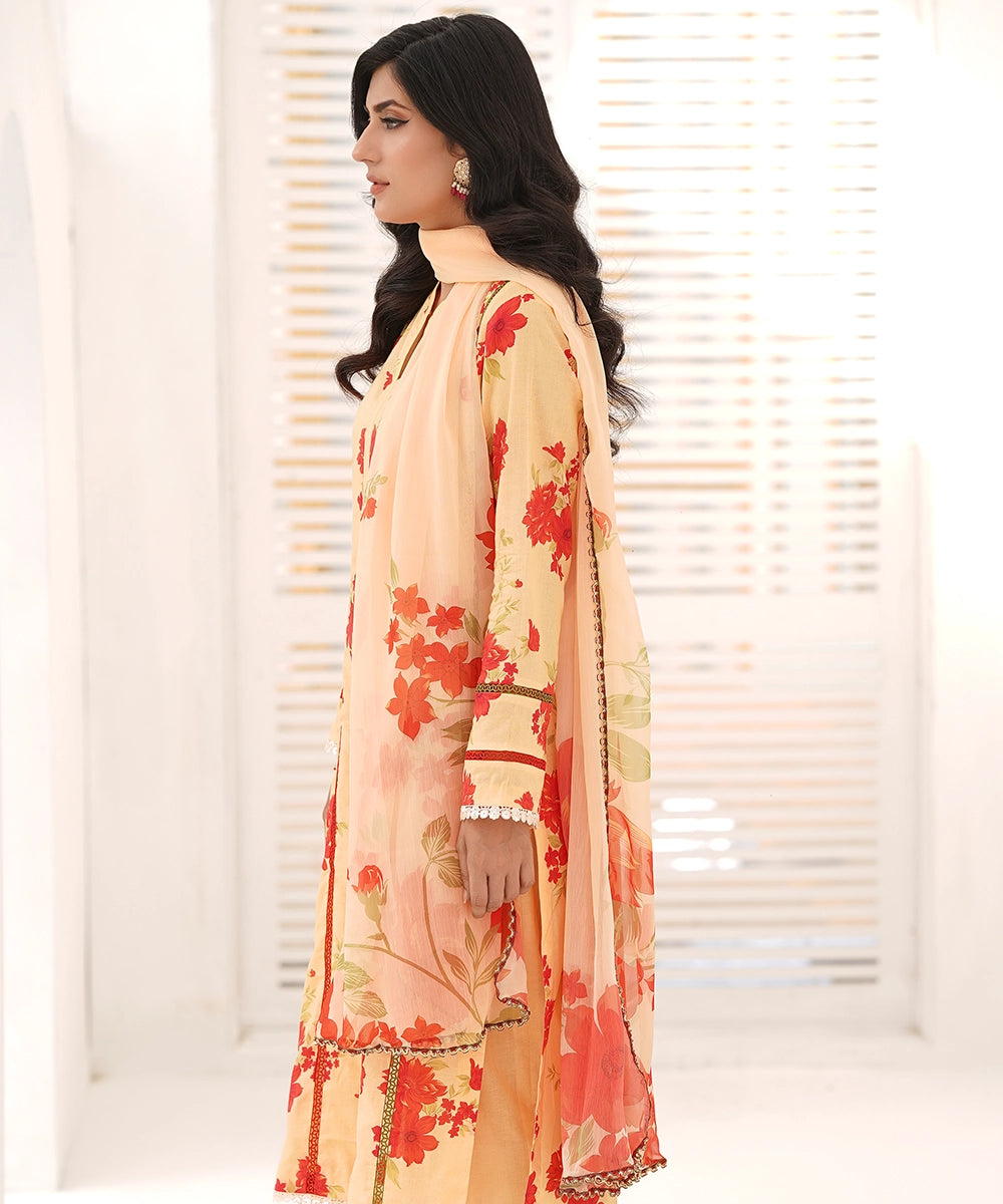 orange floral traditional women suit side profile
