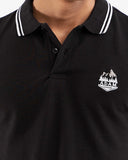 Black polo shirt, white tipping collar, side view